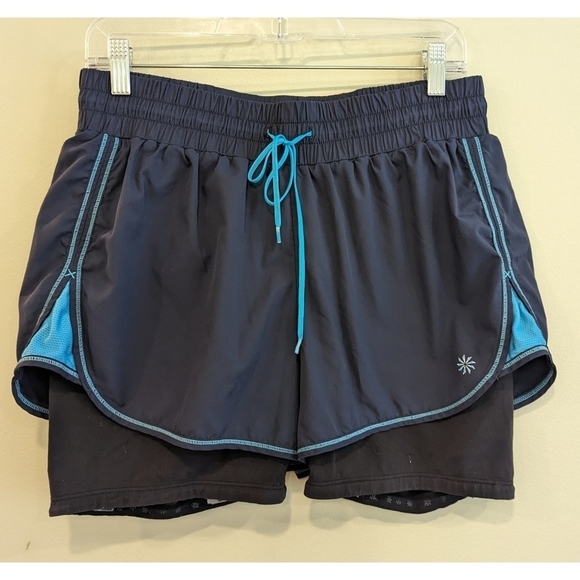 Athleta Hana 2 in 1 Black and Blue Athletic Shorts Size Medium - Picture 1 of 4